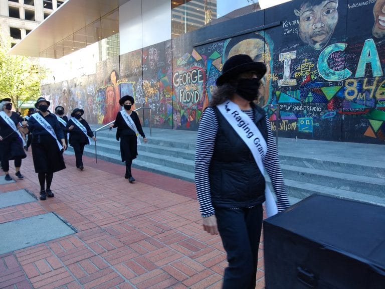 Marching to Pioneer Square.